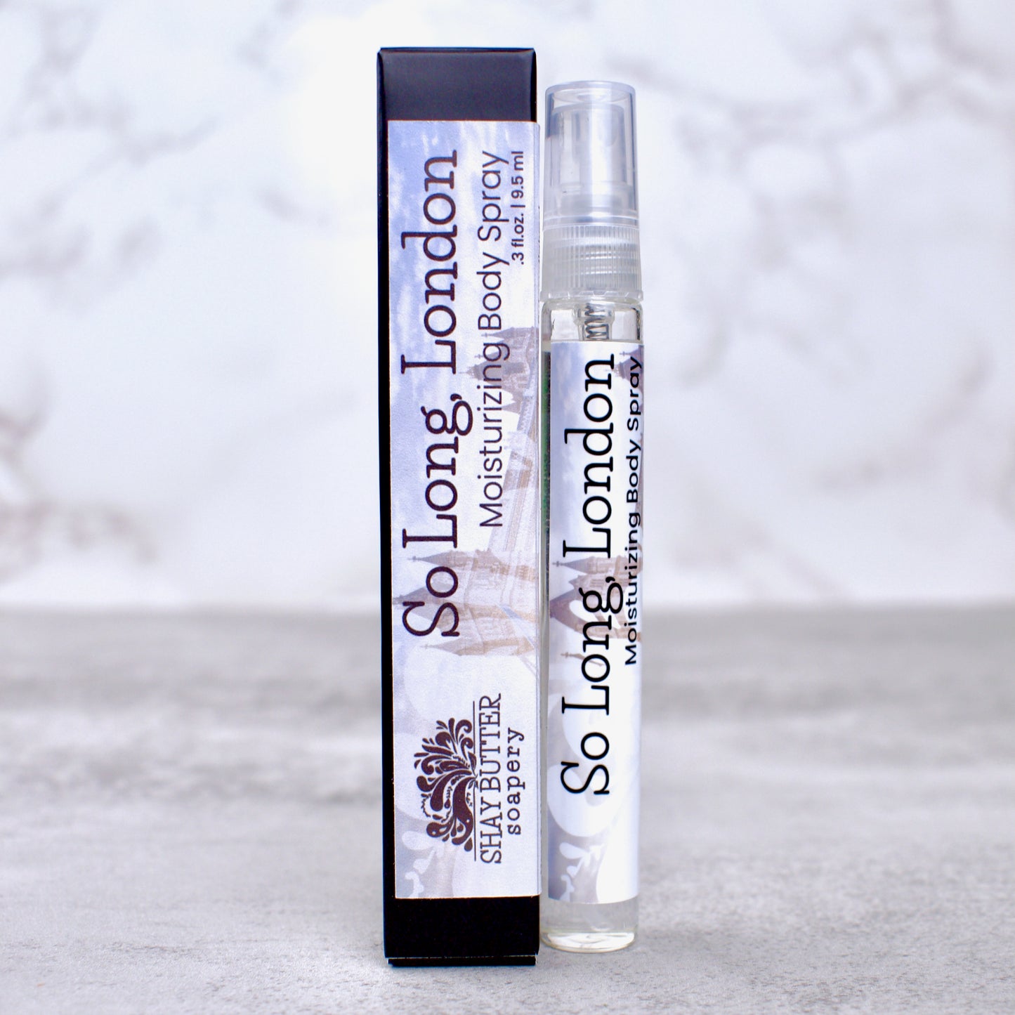"so long, london" body spray with packaging on neutral background