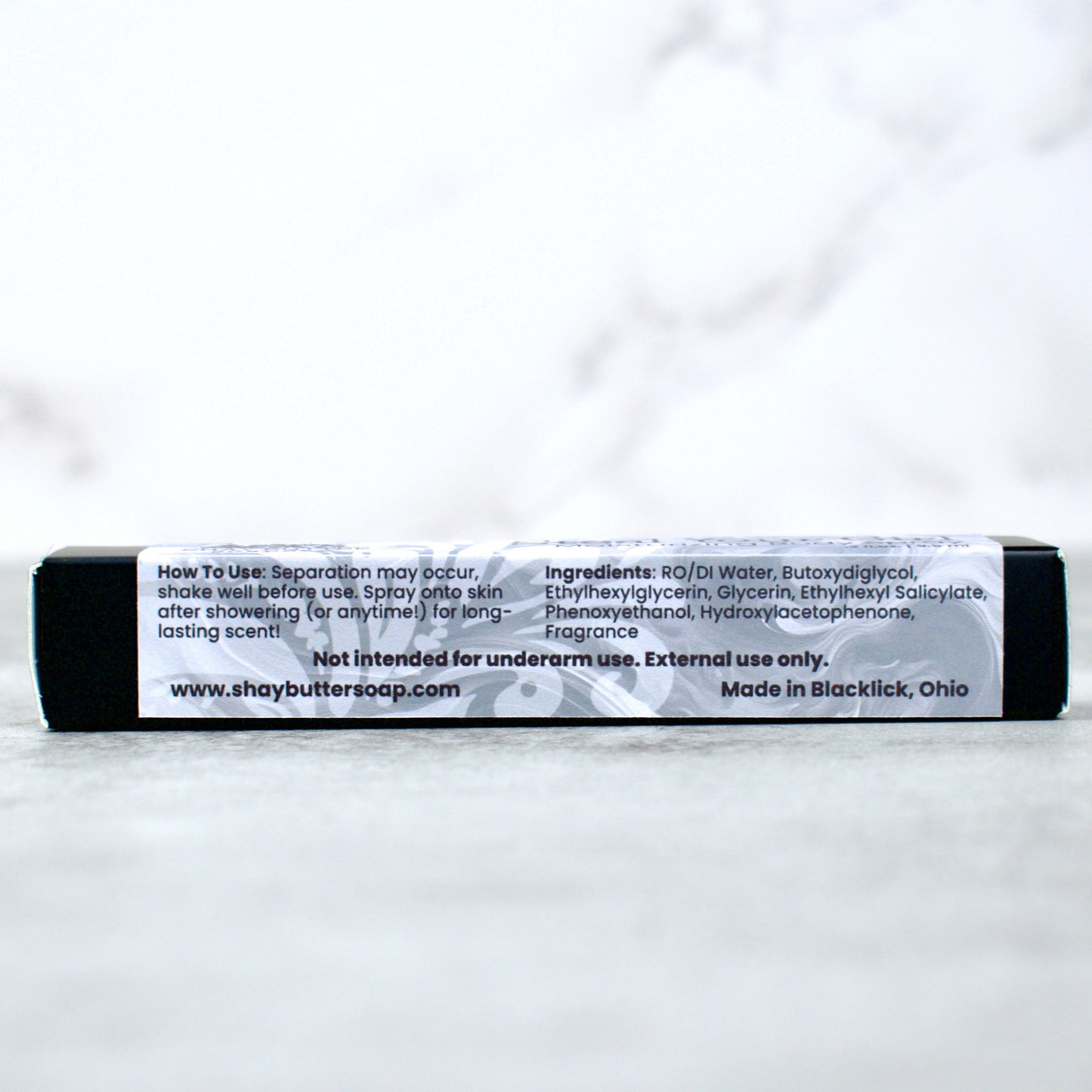 Body spray packaging with label on a white background