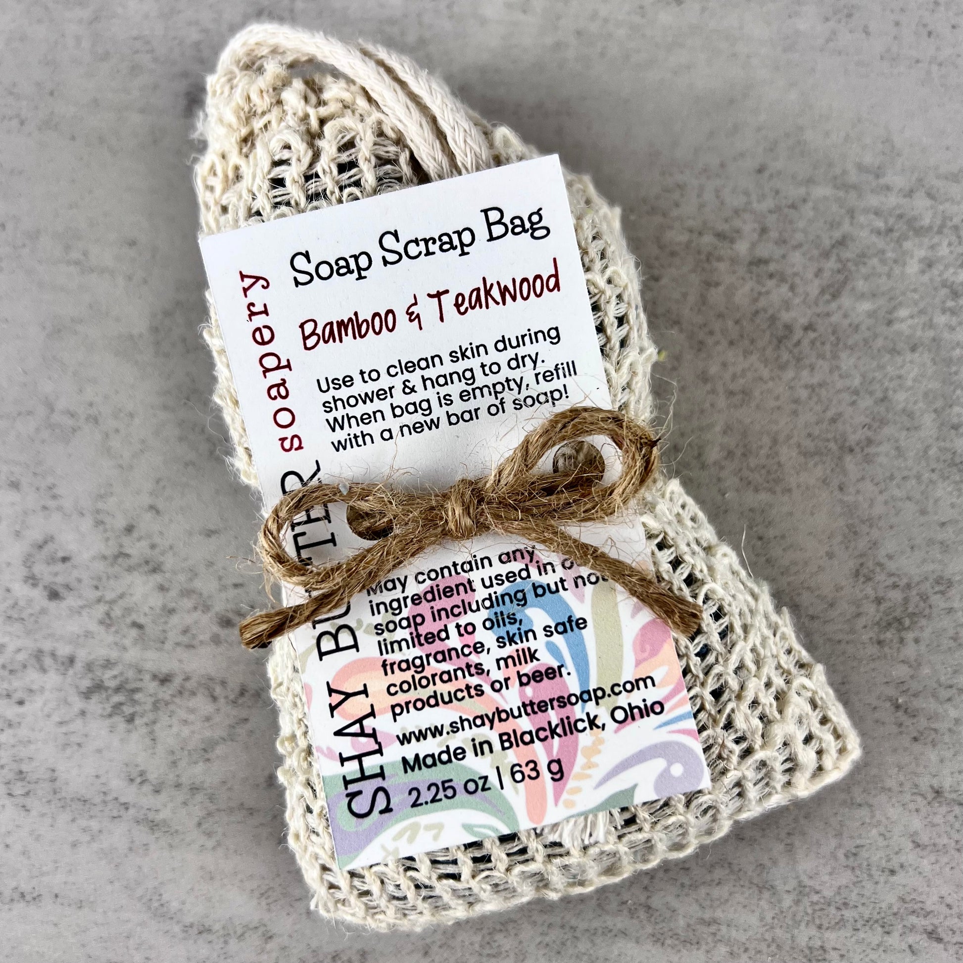 Bamboo and Teakwood Soap scrap bag on a gray background