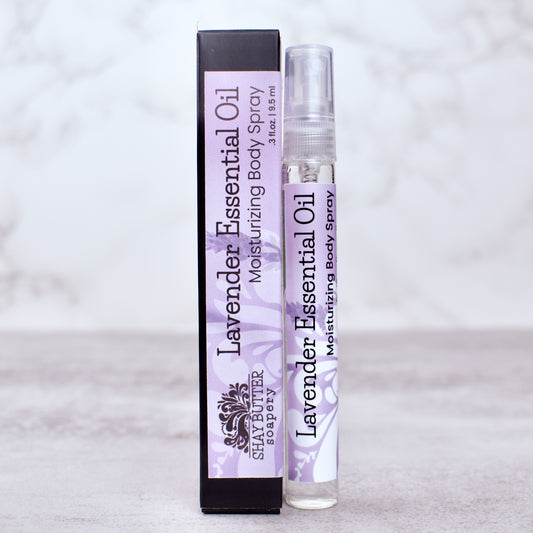 Lavender essential oil body spray with packaging on a light gray background